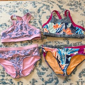 Athletic girl two pack bikinis